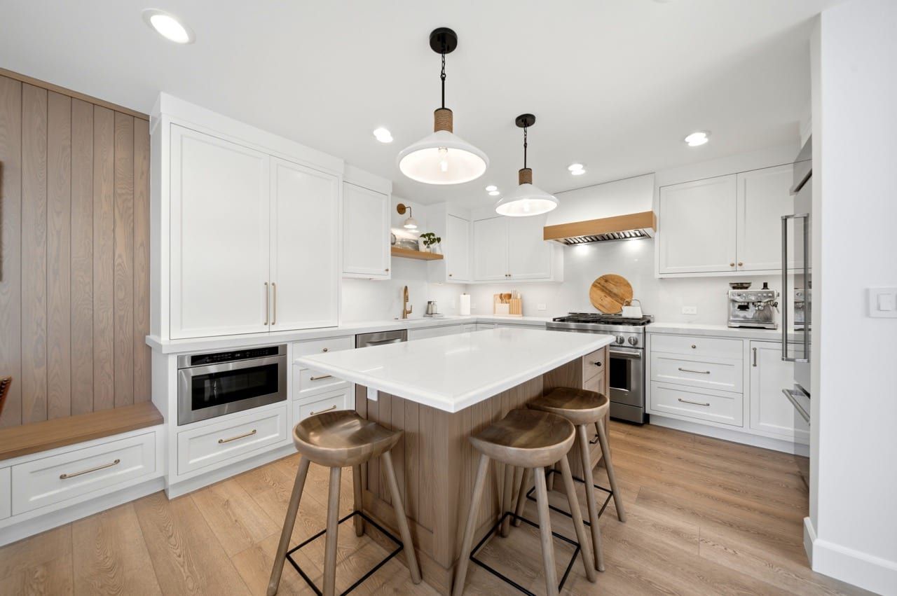 Three stools at the kitchen island