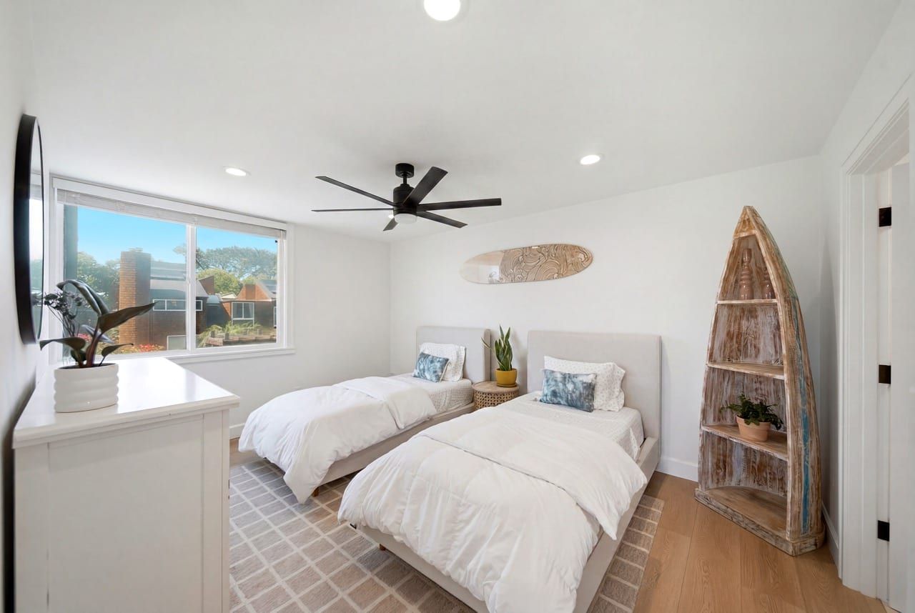 The second bedroom with two beds and its own bath